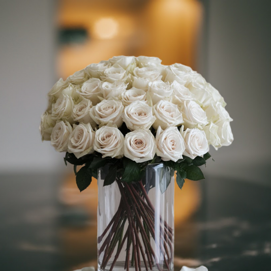 White Roses In Glass Vase